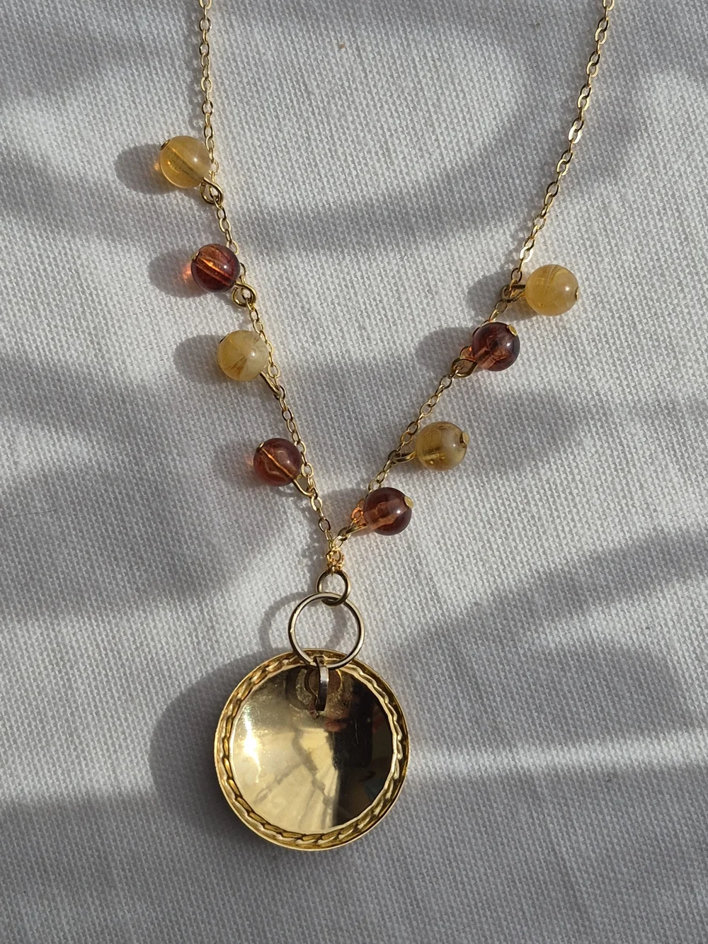 Reimagined Goldtone Swirl Pendant Necklace